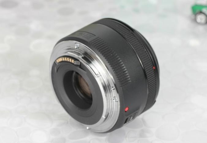 How About Canon EF 50 mm f1.8 STM Lens?